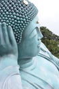 The bronze statue of reclining Buddha statue at Nanzoin Temple in Sasaguri, Fukuoka, Japan. Royalty Free Stock Photo