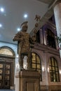 A bronze statue of a Roman Legionnaire stands in front of the Colosseum restaurant in Batumi city - the capital of Adjara in