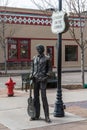 Bronze statue by Ron Adamson, forming a part of Standin` On The Corner Park in Winslow, AZ Royalty Free Stock Photo