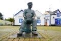 Bronze statue of seaman at English harbour