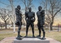 Bronze statue of the Selmon brothers by Chad Fisher on the campus of the University of Oklahoma in Norman.