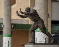 Bronze statue titled `Mean Joe Green` by sculptor Brian Hanolon at the entrance to Apogee Stadium of the University of North Texas