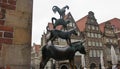 Bronze statue of the Town Musicians of Bremen in old city centre, beautiful houses on the background, Bremen, Germany Royalty Free Stock Photo