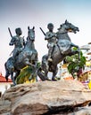 Bronze statue of two life-size horses,ridden by Khmer Warriors,carrying swords on their backs