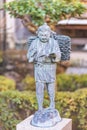 Bronze statue of the young Ninomiya Kinjiro who, although a farmer`s son, became by his self-taught studies a philosopher Royalty Free Stock Photo