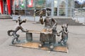 Bronze statues of characters of Soviet cartoon Three from Prostokvashino on city street