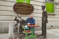 Bronze statues of Oliver Saint John Gogarty and James Joyce outside the pub of the same name in Temple Bar Dublin, Ireland with to
