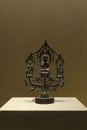 bronze statuettes of one buddha and two bodhisattvas