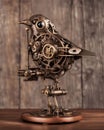 Bronze Steampunk Bird on Wooden Table