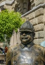 Bronze street statue of a policeman on a street in Budapest, Hungary Royalty Free Stock Photo