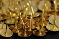 Bronze thumb tacks Royalty Free Stock Photo