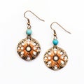 Bronze And Turquoise Floral Earrings With Intricate Cut-outs Royalty Free Stock Photo