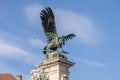 Bronze turul Bird statue on top of column at Sandor Palace on Buda Hill in Budapest winter morning