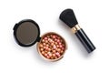 Bronzing pearls and makeup brush Royalty Free Stock Photo