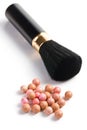 Bronzing pearls and makeup brush Royalty Free Stock Photo