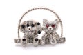Brooch as a kitten and dog on a white background Royalty Free Stock Photo