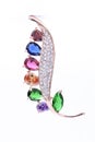 Brooch with colored gems isolated on white Royalty Free Stock Photo