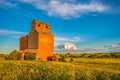 Brooking, SK- July 18, 2020: Sunset over the abandoned grain elevator in the ghost town of Brooking, SK