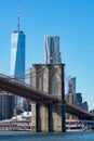 The Brooklyn Bridge with an American Flag over the East River with the Lower Manhattan New York City Skyline Royalty Free Stock Photo