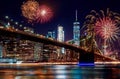 Brooklyn Bridge at dusk in New York City Colorful and vibrant fireworks Royalty Free Stock Photo