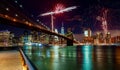 Brooklyn Bridge at dusk in New York City Colorful and vibrant fireworks Royalty Free Stock Photo