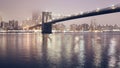 Brooklyn Bridge at a foggy night, New York City, USA Royalty Free Stock Photo