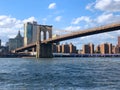 Brooklyn Bridge with Hudson river and Manhattan skyline, New York City downtown. Royalty Free Stock Photo