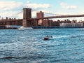 Brooklyn Bridge with Hudson river and Manhattan skyline, New York City downtown. Royalty Free Stock Photo