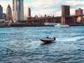 Brooklyn Bridge with Hudson river and Manhattan skyline, New York City downtown. Royalty Free Stock Photo