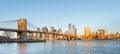 Brooklyn Bridge and Lower Manhattan with Freedom Tower in Morning Light. Royalty Free Stock Photo