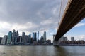 The Brooklyn Bridge and the Lower Manhattan Skyline in New York City along the East River Royalty Free Stock Photo