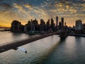 Brooklyn Bridge and Manhattan over East River at sunset, New York US Royalty Free Stock Photo