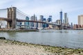 Brooklyn Bridge New York City and Hudson river with Manhattan Skyline in the Background Royalty Free Stock Photo