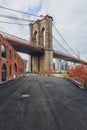 Brooklyn bridge over Brooklyn Bridge Park in Brooklyn, with skyline of Manhattan, in New York City, USA Royalty Free Stock Photo