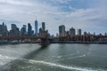 Brooklyn Bridge over East River view lower Manhattan waterfront New York City