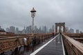 Brooklyn Bridge at rainy day in New York. USA