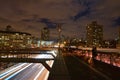 Brooklyn Bridge at Twilight with dramatic cloud and traffic below