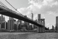 brooklyn bridge view over hudson river with nyc skyline background (urban cityscape of manhattan) Royalty Free Stock Photo