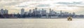 Brooklyn Cityscape Panoramic View. A Water Taxi is Crossing the East River in Manhattan, New York City Royalty Free Stock Photo