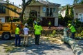 New York City Parks crew works to remove a fallen tree and clears street the aftermath of severe weather after storm Isaias Royalty Free Stock Photo