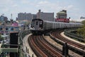 NYC Subway Q Train arrives at West 8 Street Station in Brooklyn Royalty Free Stock Photo