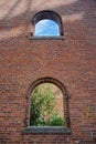 Brooklyn, New York: Brick wall of an old factory with two windows