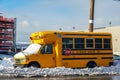 School bus under snow in Brooklyn, New York after massive Winter Storm Gail Royalty Free Stock Photo