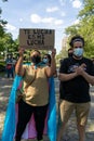 Peaceful protest at Grand army Plaza. Protesters holding signs