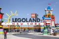 Brooklyn, NY - April 24 2021: Visitors pass through the colorful entrance gate to Legoland in New York. Lego building blocks