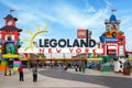 Brooklyn, NY - April 24 2021: Visitors pass through the colorful entrance gate to Legoland in New York. Lego building blocks