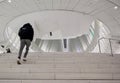 people walking inside the modern Oculus building in World Trade Center transportation hub in lower Manhattan, New York City. Royalty Free Stock Photo