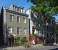 Three early 19th century wood frame houses on Middagh Street in Brooklyn Heights, NYC with clapboard facades