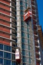 Construction elevators in use on a residential building under construction in Greenpoint, NYC