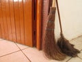 A Broom And Duster Ready To Clean The Floor